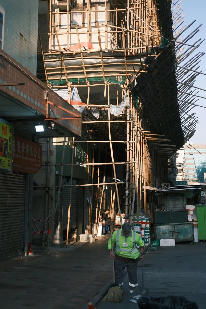 Bamboo scaffolding erected around a building under construction
